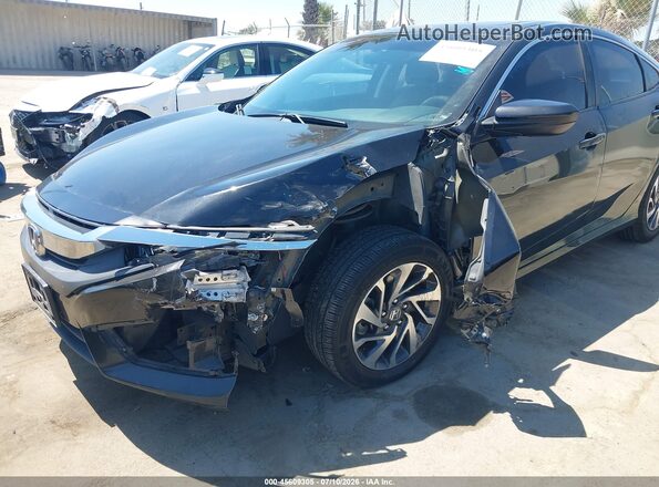 2HGFC2F77JH565281 2018 HONDA CIVIC Black Vista frontal