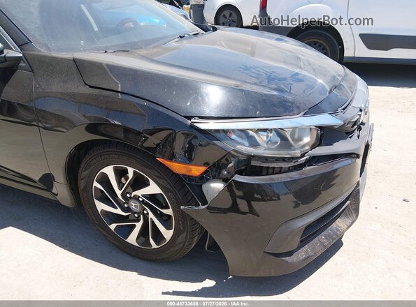 2HGFC2F79GH577909 2016 HONDA CIVIC Black 