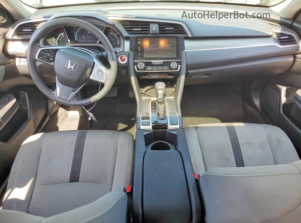 2HGFC2F79JH556243 2018 HONDA CIVIC Gray Vista del salpicadero