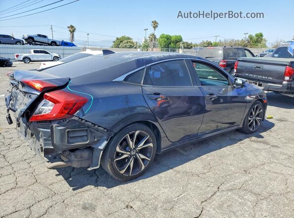 2HGFC2F79JH556243 2018 HONDA CIVIC Gray Trasero derecho