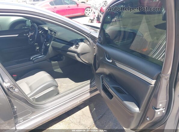 2HGFC2F81MH548599 2021 HONDA CIVIC Gray Front interior view