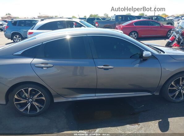 2HGFC2F81MH548599 2021 HONDA CIVIC Gray Rear interior view