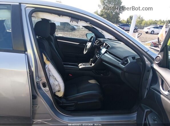 2HGFC2F89LH594583 2020 HONDA CIVIC Silver Widok wnętrza z przodu