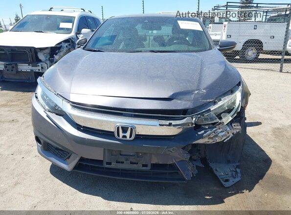 2HGFC3B97GH360792 2016 HONDA CIVIC Gray Սալոնի հետևի տեսք