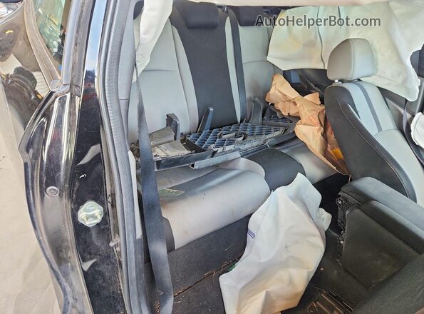 2HGFC4B04GH310293 2016 HONDA CIVIC Black Rear seats view
