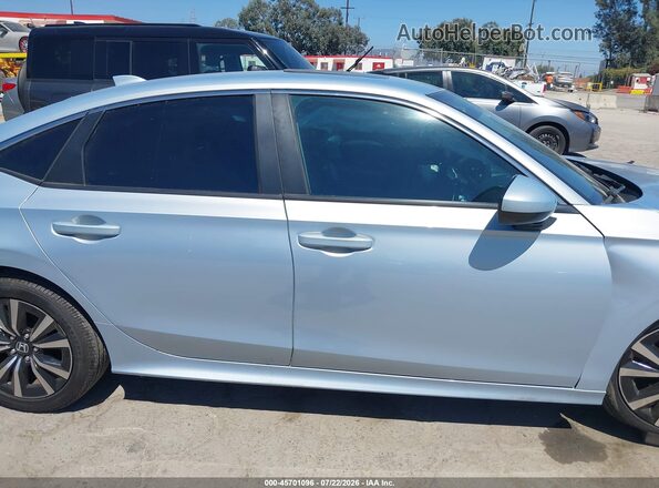 2HGFE1F7XNH307296 2022 HONDA CIVIC Light Blue Vista interior trasera