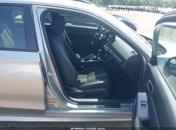 2HGFE2F59TH556061 2026 HONDA CIVIC Silver Widok wnętrza z przodu