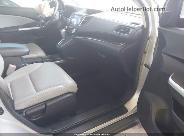 2HKRM3H78GH565110 2016 HONDA CR-V Silver Widok wnętrza z przodu