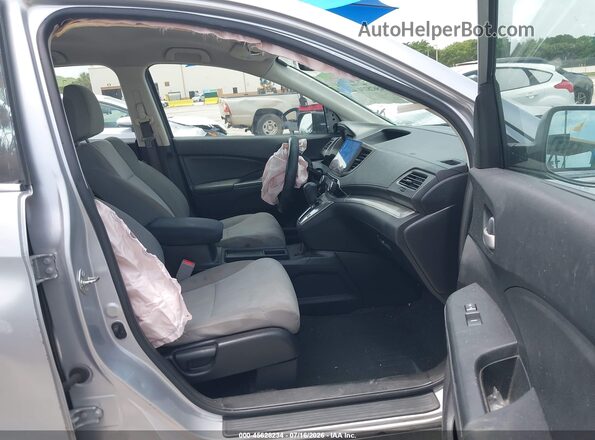 2HKRM4H32GH614059 2016 HONDA CR-V Серебряный Вид салона спереди