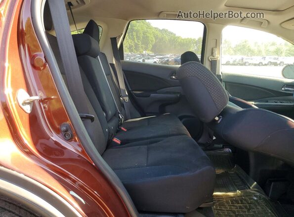 2HKRM4H59GH624380 2016 HONDA CR-V Maroon Widok wnętrza z tyłu