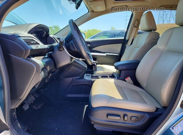 2HKRM4H71GH713099 2016 HONDA CR-V Blue Front interior view
