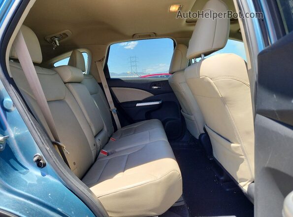 2HKRM4H71GH713099 2016 HONDA CR-V Blue Rear interior view
