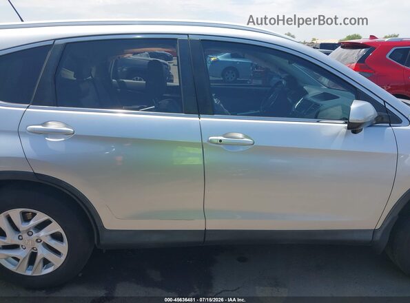 2HKRM4H72GH662910 2016 HONDA CR-V Серебряный Вид задней части салона