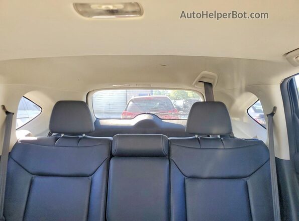 2HKRM4H75GH721111 2016 HONDA CR-V Black Vista de los asientos traseros