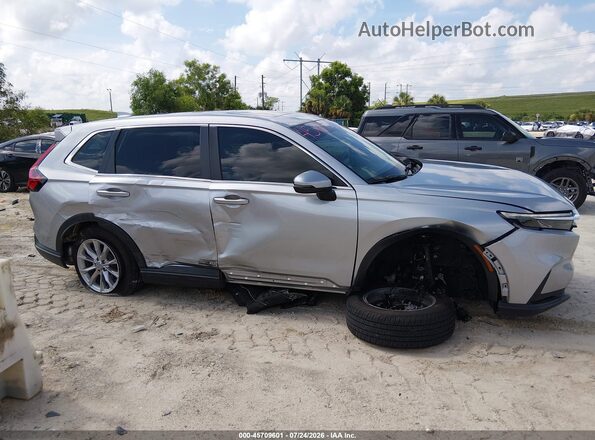2HKRS3H40RH330697 2024 HONDA CR-V Серебряный Вид задней части салона
