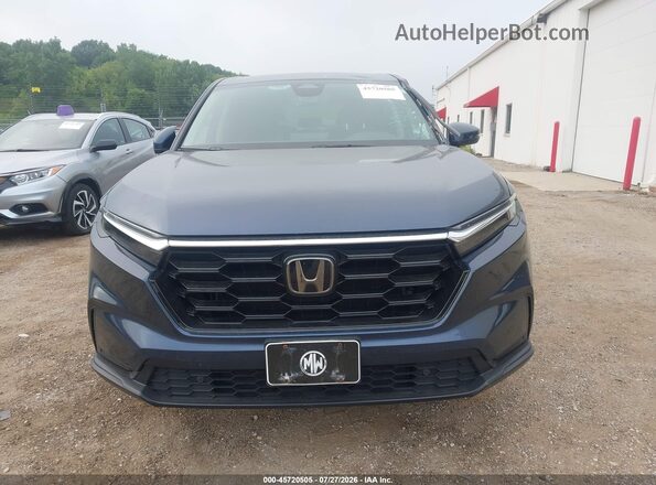 2HKRS4H74PH418035 2023 HONDA CR-V Blue Вид задньої частини салону