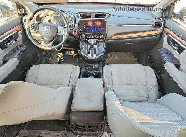 2HKRW2H50KH640099 2019 HONDA CR-V Серебряный Вид панели приборов