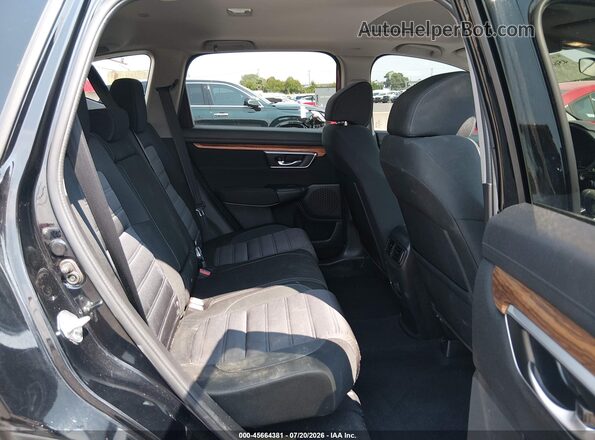 2HKRW2H51MH657657 2021 HONDA CR-V Black VIN კოდის სტიკერის ხედი