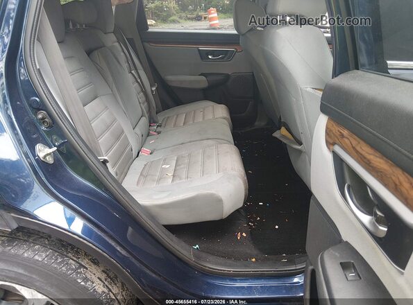 2HKRW2H52JH634593 2018 HONDA CR-V Blue VIN կոդի պիտակի տեսք