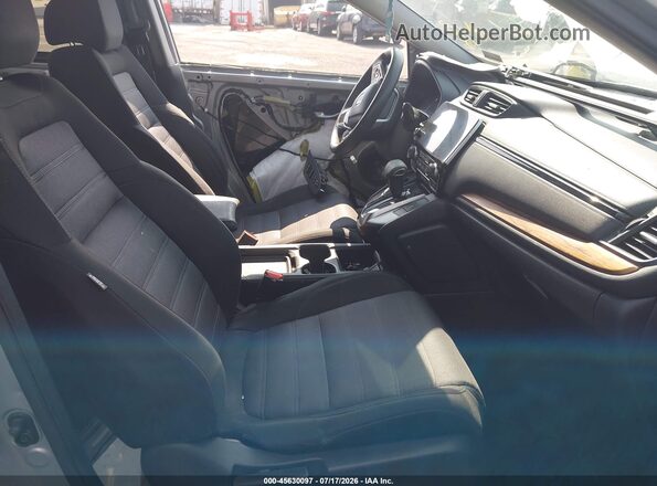 2HKRW2H53KH676823 2019 HONDA CR-V Silver Front interior view