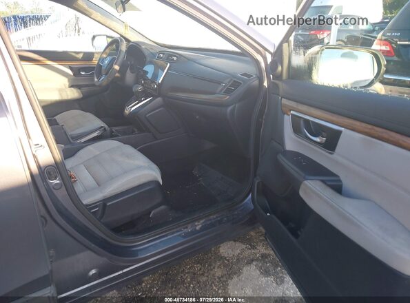 2HKRW2H55HH688075 2017 HONDA CR-V Gray Widok wnętrza z przodu
