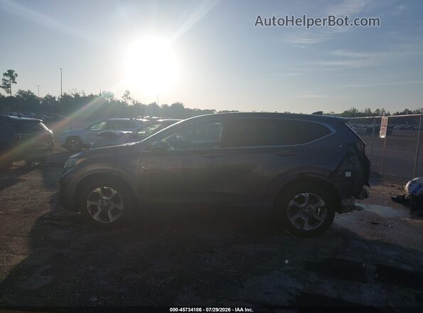 2HKRW2H55HH688075 2017 HONDA CR-V Gray Widok wnętrza z tyłu