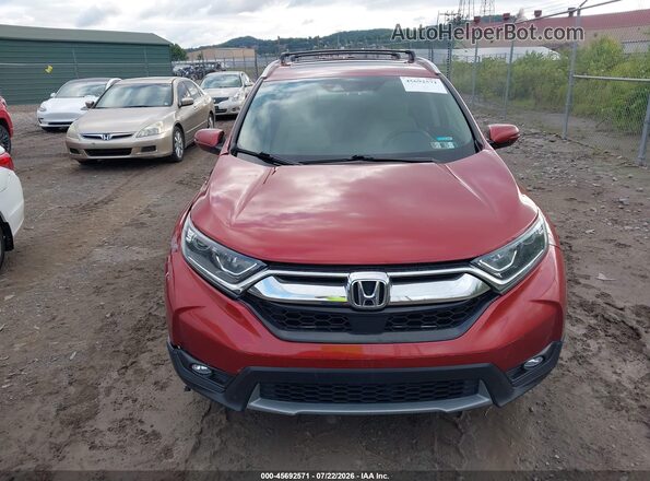 2HKRW2H59HH649781 2017 HONDA CR-V Orange Widok wnętrza z tyłu