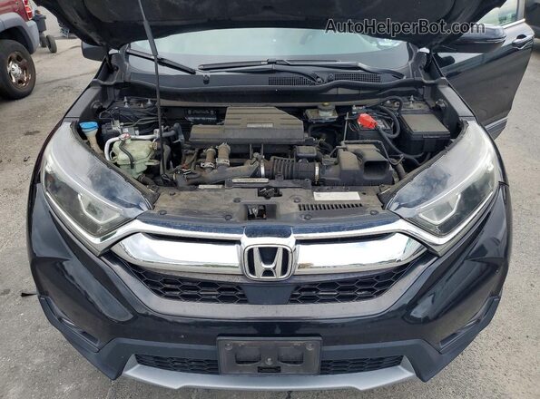 2HKRW2H80HH684784 2017 HONDA CR-V Black Widok wnętrza z tyłu