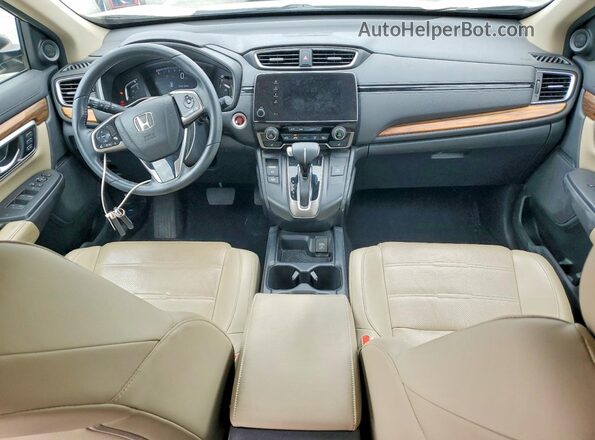 2HKRW2H80JH682216 2018 HONDA CR-V Gold Dashboard view