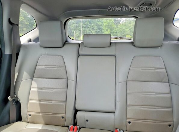 2HKRW2H84HH647348 2017 HONDA CR-V Silver Rear seats view
