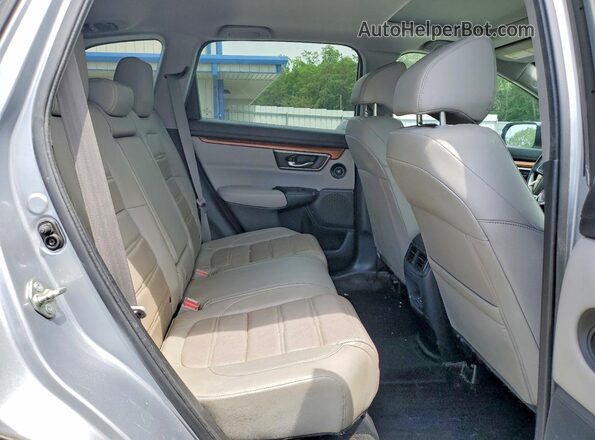 2HKRW2H84HH647348 2017 HONDA CR-V Silver Rear interior view