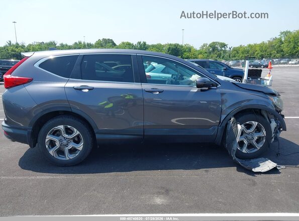 2HKRW2H85HH624435 2017 HONDA CR-V Gray Вид задньої частини салону