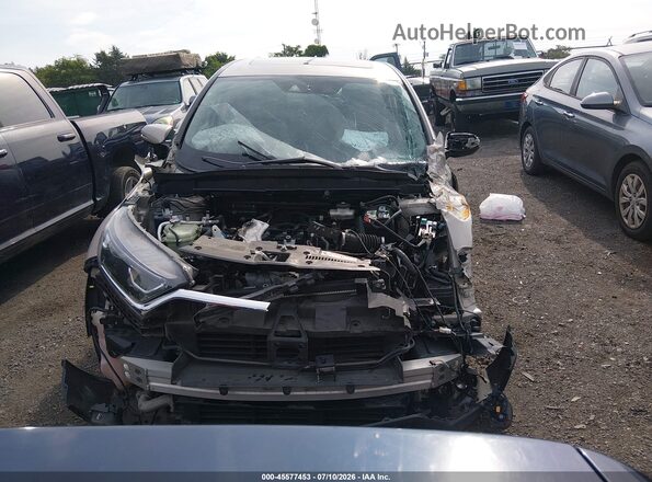 2HKRW2H89JH686877 2018 HONDA CR-V Beige Vista interior trasera