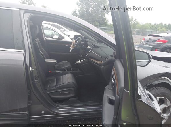 2HKRW2H8XKH644543 2019 HONDA CR-V Gray Front interior view