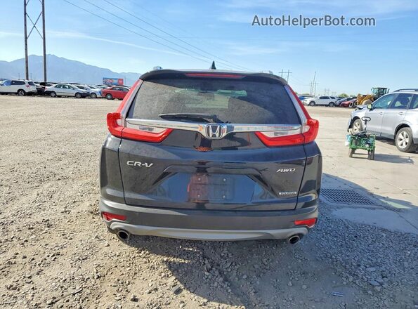 2HKRW2H91HH612582 2017 HONDA CR-V Black Rear view