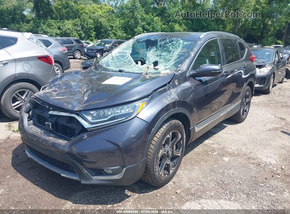 2HKRW2H94KH640643 2019 HONDA CR-V Gray Vista tres cuartos delantera izquierda