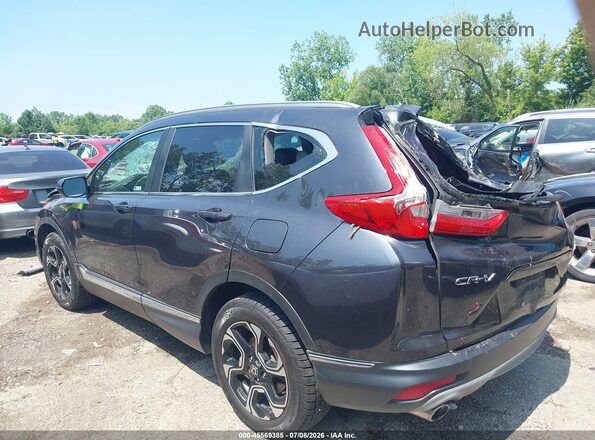 2HKRW2H94KH640643 2019 HONDA CR-V Gray Vista interior trasera