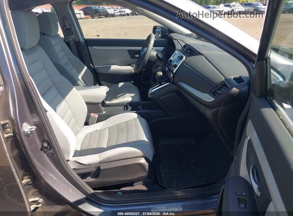 2HKRW6H39HH223451 2017 HONDA CR-V Gray Front interior view