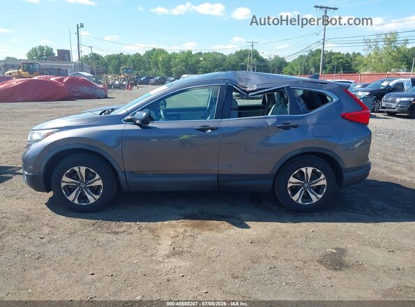 2HKRW6H39HH223451 2017 HONDA CR-V Gray 360 interior view
