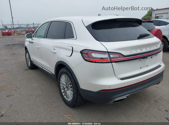 2LMPJ6J97KBL61299 2019 LINCOLN NAUTILUS White Trasero izquierdo