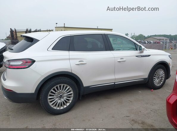 2LMPJ6J97KBL61299 2019 LINCOLN NAUTILUS White Vista interior trasera