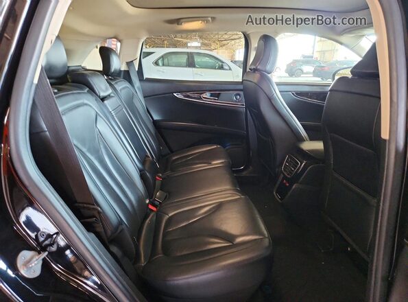 2LMPJ6K93NBL00731 2022 LINCOLN NAUTILUS Black Вид задньої частини салону