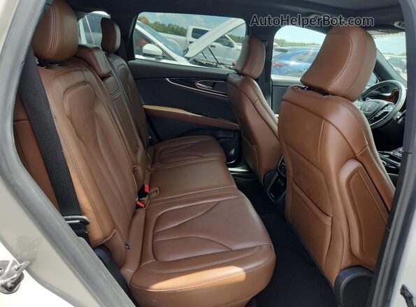 2LMPJ6K93PBL02871 2023 LINCOLN NAUTILUS Beige Vista interior trasera