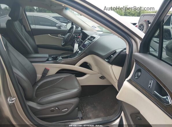 2LMPJ6K9XLBL04532 2020 LINCOLN NAUTILUS Gold წინა სალონის ხედი