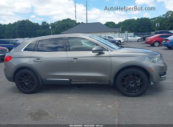 2LMPJ6KR9HBL44219 2017 LINCOLN MKX Gray Widok wnętrza z tyłu