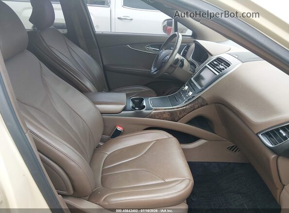 2LMPJ6LR1GBL35334 2016 LINCOLN MKX Brown Widok wnętrza z przodu