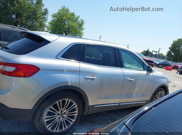 2LMPJ6LR1JBL12711 2018 LINCOLN MKX Silver Vista interior trasera
