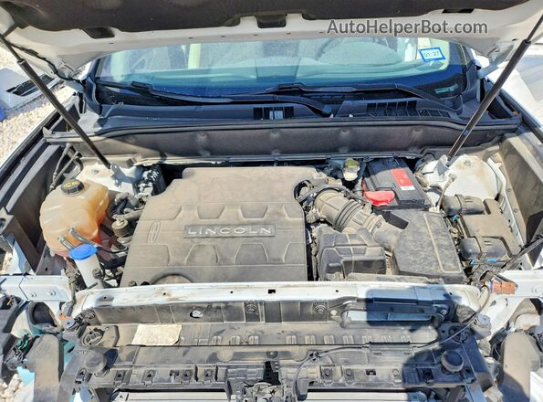 2LMPJ6LR7JBL23129 2018 LINCOLN MKX Белый Вид задней части салона