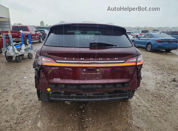 2LMPJ8K93NBL25446 2022 LINCOLN NAUTILUS Maroon Вид ззаду