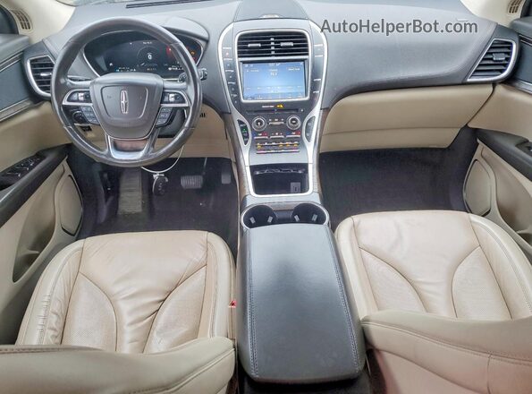 2LMPJ8K96KBL58548 2019 LINCOLN NAUTILUS Tan Vista del salpicadero